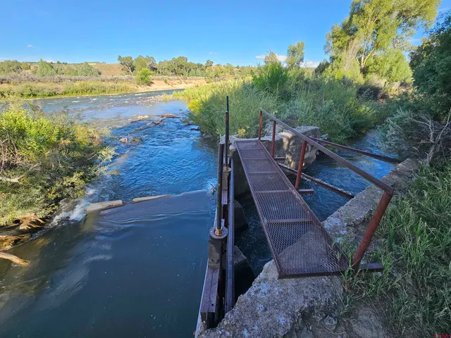 a view of a balcony with an ocean