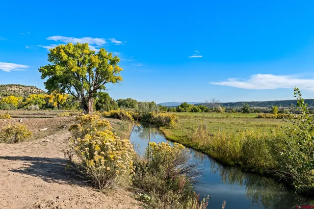 a view of a lake with a mountain in the background