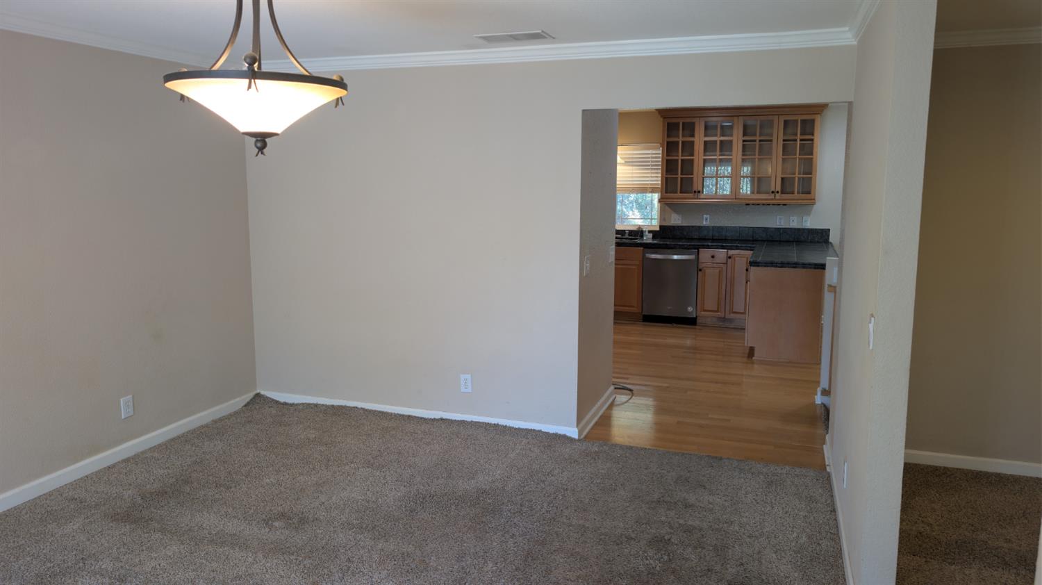 3248 Sudbury Road Cameron Park, CA 95682 - Photo 12 of 41 a view of a kitchen cabinets and a counter place