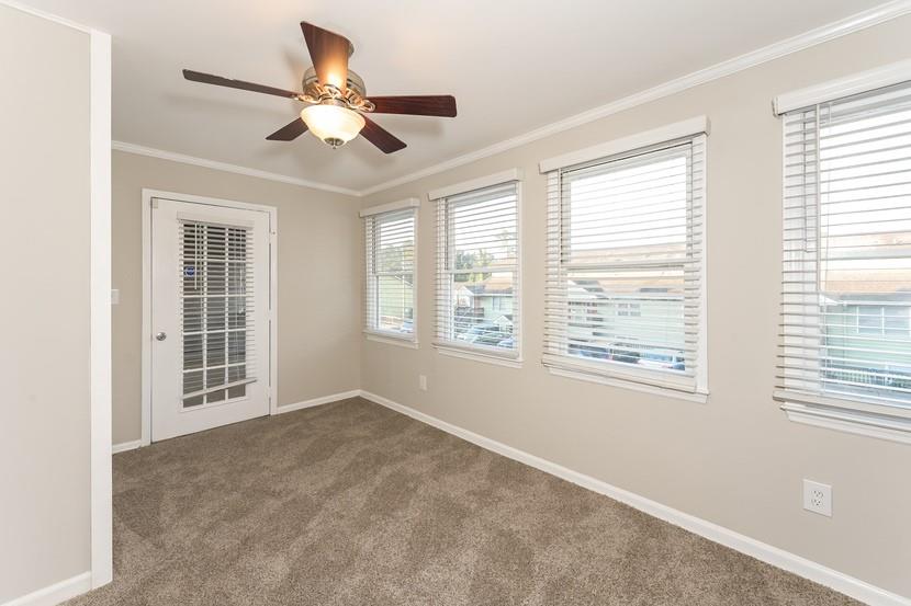 2505 West Broad Street, Unit 122 Athens, GA 30606 - Photo 4 of 15 a view of an empty room with a window