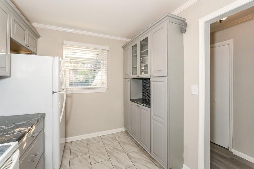 2505 West Broad Street, Unit 122 Athens, GA 30606 - Photo 7 of 15 a view of kitchen with furniture and refrigerator
