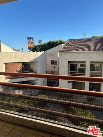 a front view of a house with a balcony
