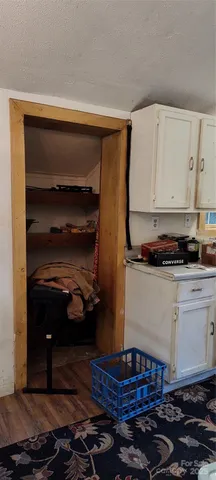 a bathroom with a granite countertop sink
