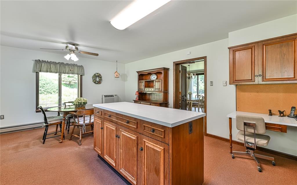 2371 Oakview Drive Pittsburgh, PA 15237 - Photo 14 of 25 a kitchen that has a table and chairs in it