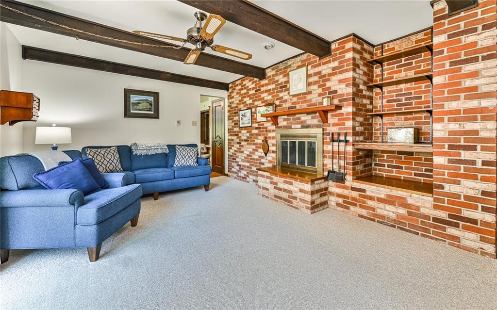 2371 Oakview Drive Pittsburgh, PA 15237 - Photo 16 of 25 a living room with furniture and a fireplace