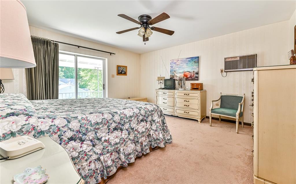 2371 Oakview Drive Pittsburgh, PA 15237 - Photo 17 of 25 a bedroom with a bed and a chair