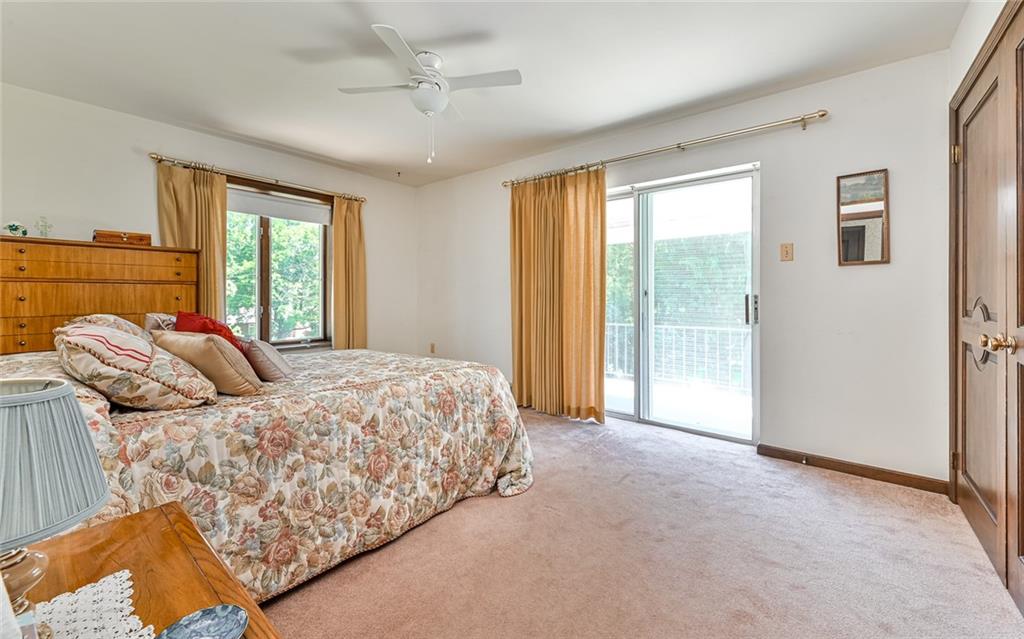 2371 Oakview Drive Pittsburgh, PA 15237 - Photo 19 of 25 a bed sitting in a bedroom next to a window