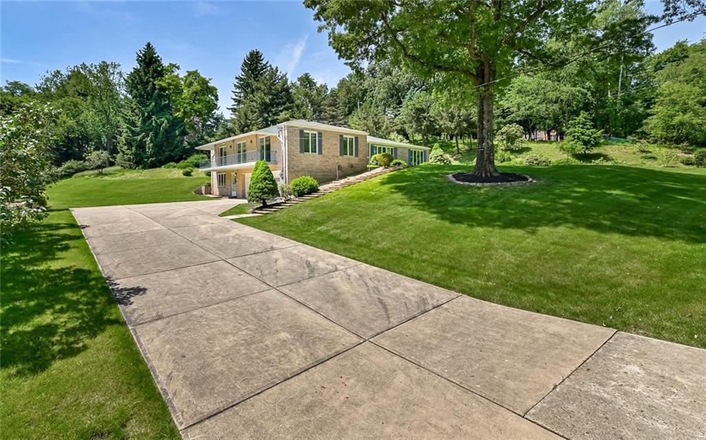 2371 Oakview Drive Pittsburgh, PA 15237 - Photo 2 of 25 a house view with a garden space