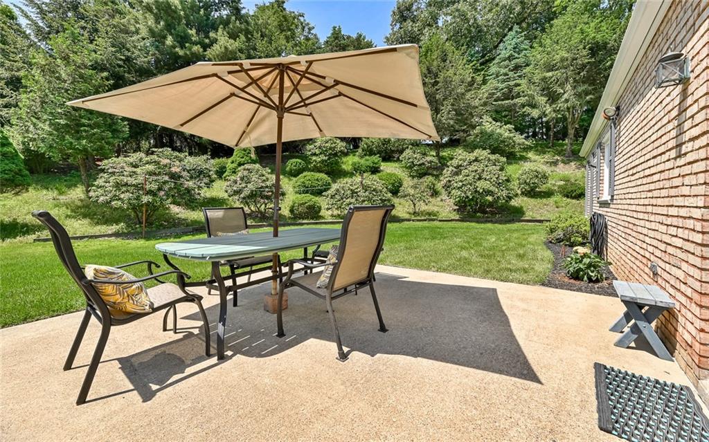 2371 Oakview Drive Pittsburgh, PA 15237 - Photo 23 of 25 a patio with a patio table and chairs