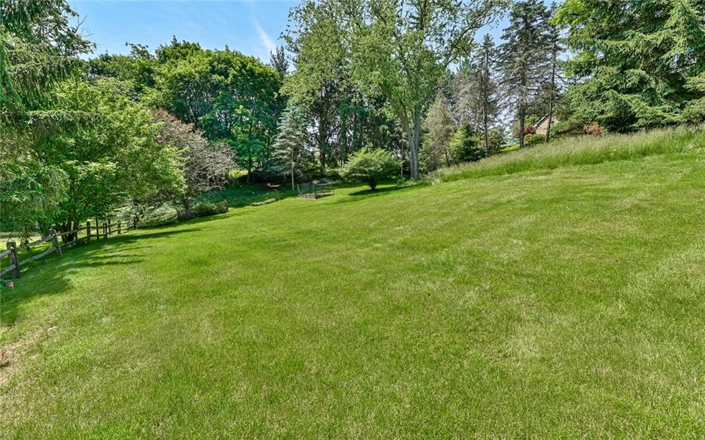 2371 Oakview Drive Pittsburgh, PA 15237 - Photo 5 of 25 a view of a grassy field with trees