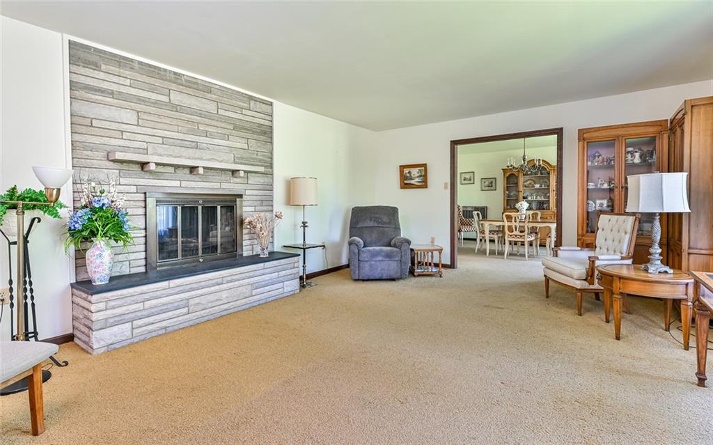 2371 Oakview Drive Pittsburgh, PA 15237 - Photo 7 of 25 a living room with furniture and a fireplace