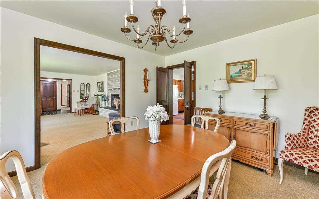 2371 Oakview Drive Pittsburgh, PA 15237 - Photo 10 of 25 a dining room with a table chair and chandelier
