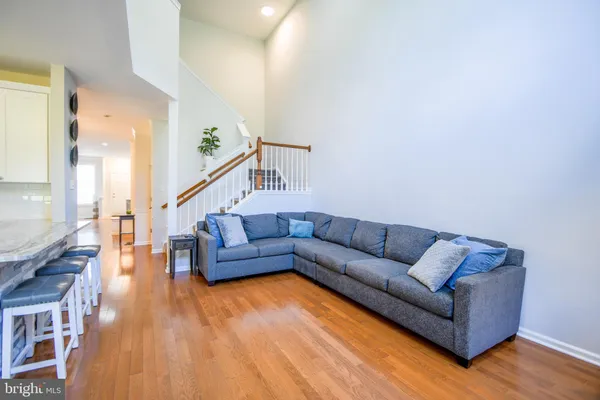 a view of a house with a yard and deck