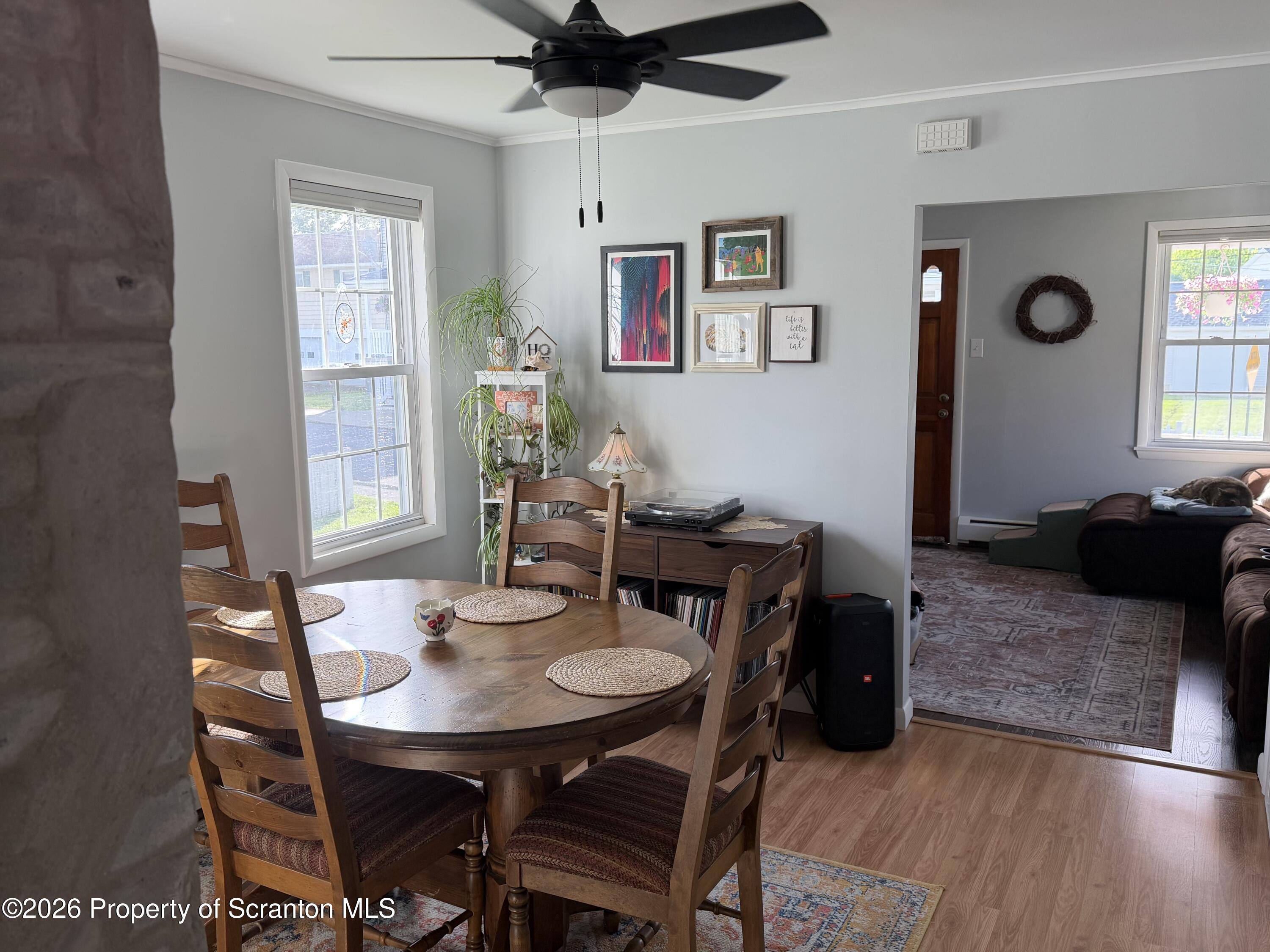 320 Haverly Street Throop, PA 18512 - Photo 10 of 27 a view of a dining room with furniture and wooden floor
