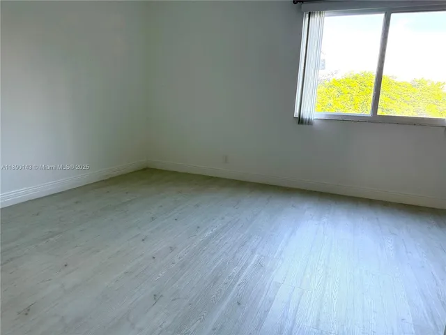 a view of building with trees