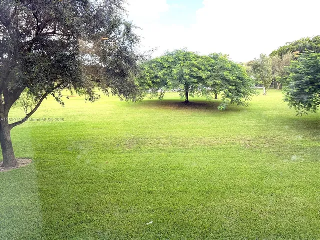 a view of a green yard