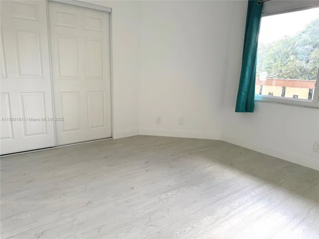 a view of a window in an empty room