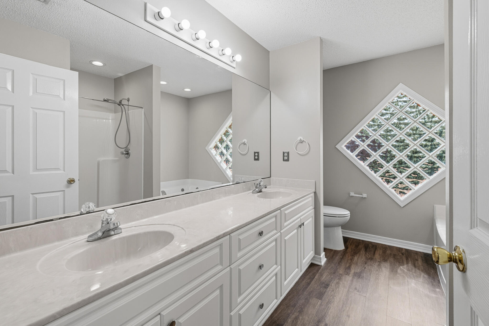643 Alysheba Drive Crestview, FL 32539 - Photo 22 of 36 a bathroom with a double vanity sink mirror and double