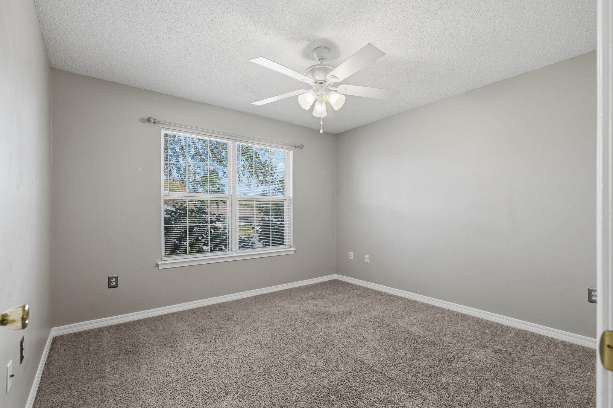 643 Alysheba Drive Crestview, FL 32539 - Photo 27 of 36 an empty room with a window