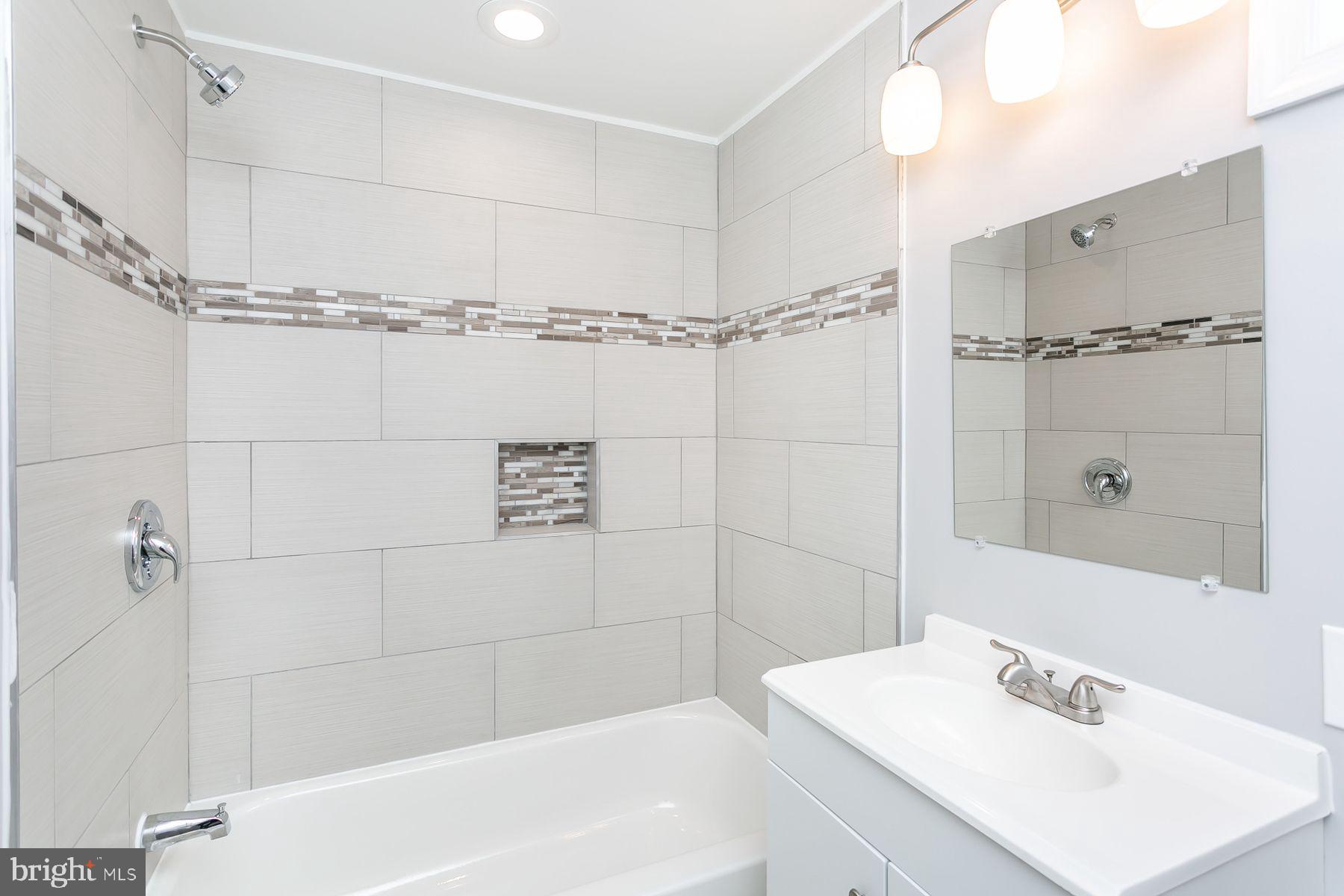 4621 Moravia Road Baltimore, MD 21206 - Photo 40 of 54 Lower level bath with tub