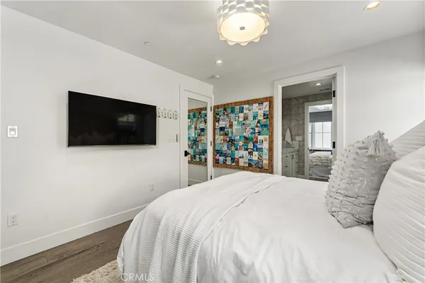 a bathroom with a shower a toilet and a sink