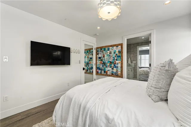 a bathroom with a shower a toilet and a sink