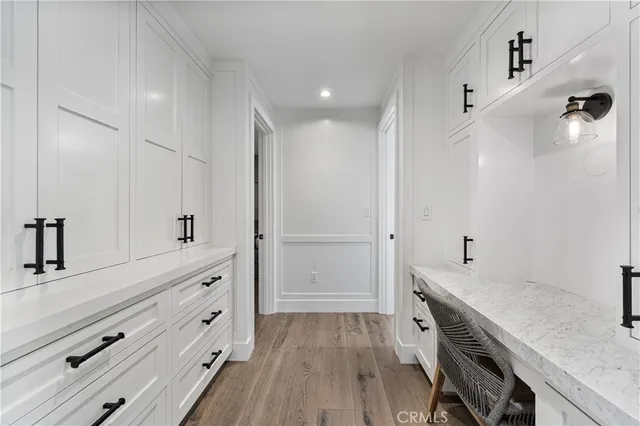 a bathroom with a sink and vanity