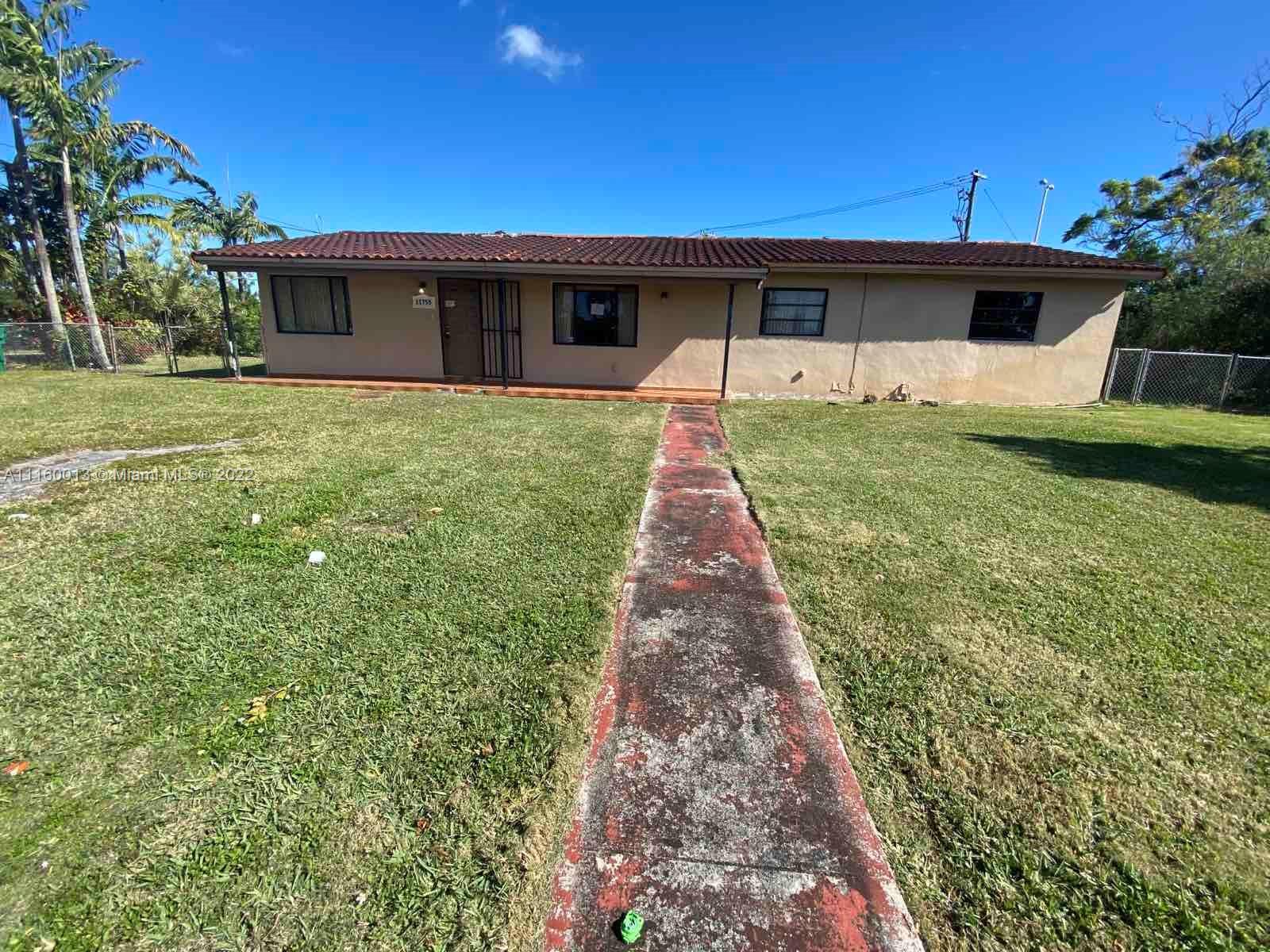 a front view of house with yard