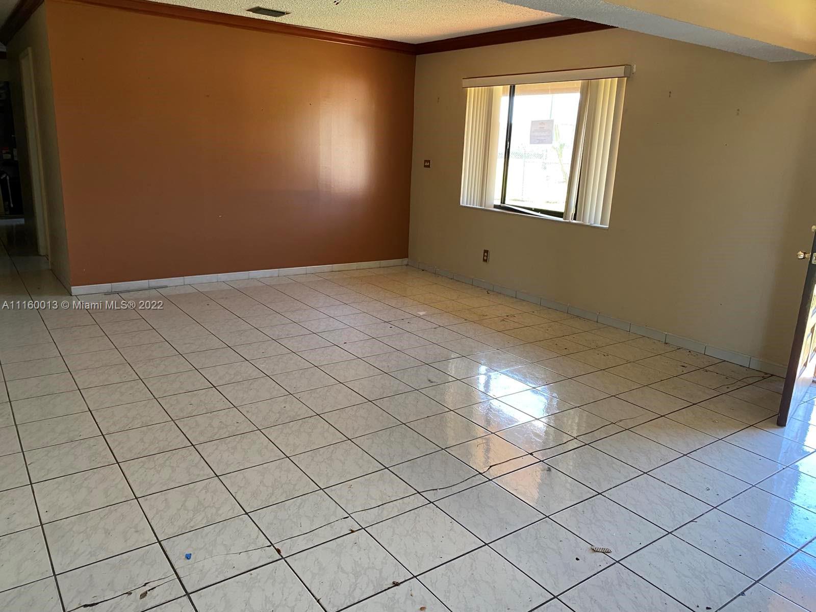 11755 Southwest 37th Street Miami, FL 33175 - Photo 8 of 11 a view of empty room