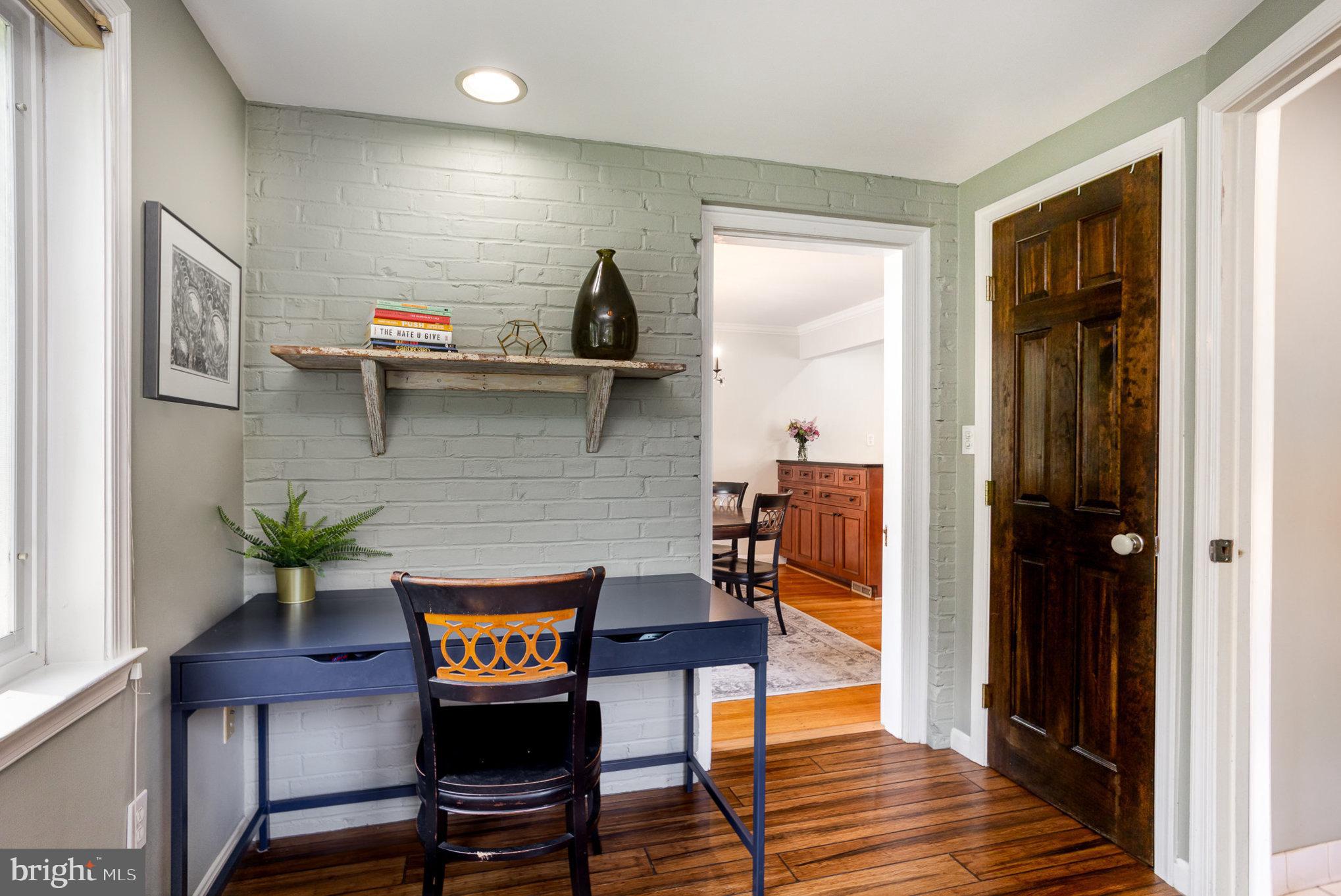 4407 Sedgwick Road Baltimore, MD 21210 - Photo 15 of 42 a living room with furniture and wooden floor