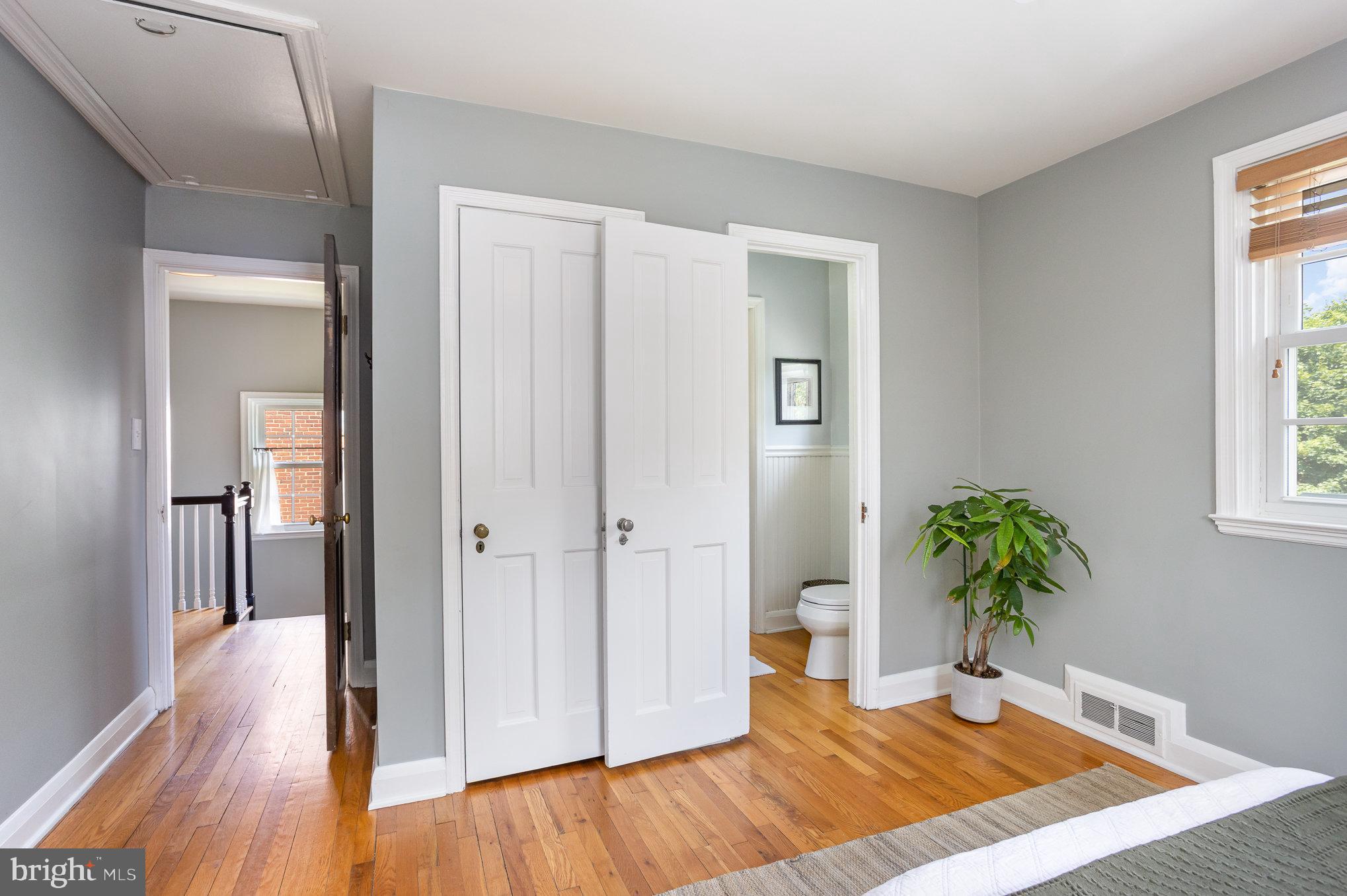 4407 Sedgwick Road Baltimore, MD 21210 - Photo 19 of 42 a view of a room with wooden floor and a potted plant