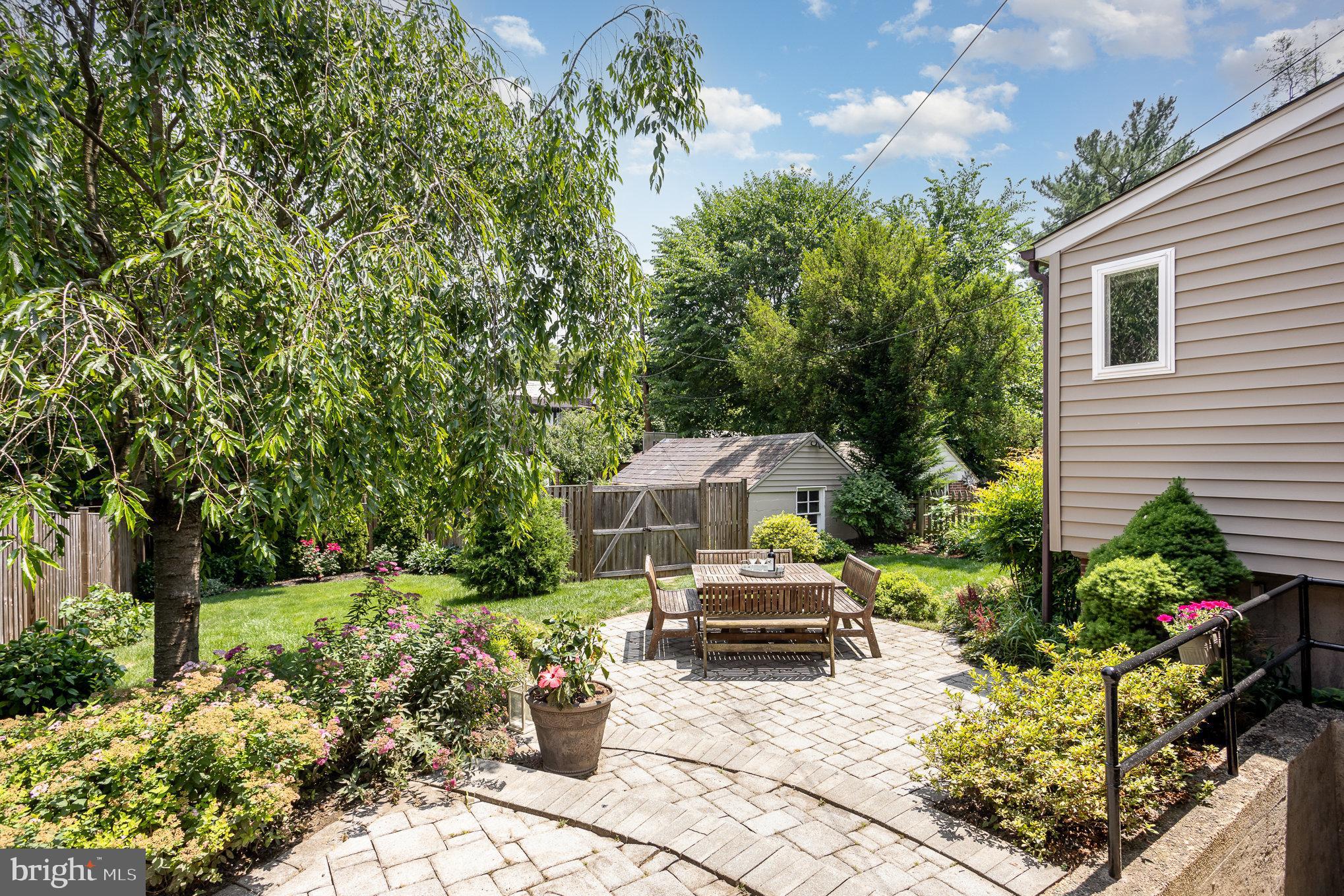 4407 Sedgwick Road Baltimore, MD 21210 - Photo 2 of 42 a view of a patio with table and chairs and potted plants
