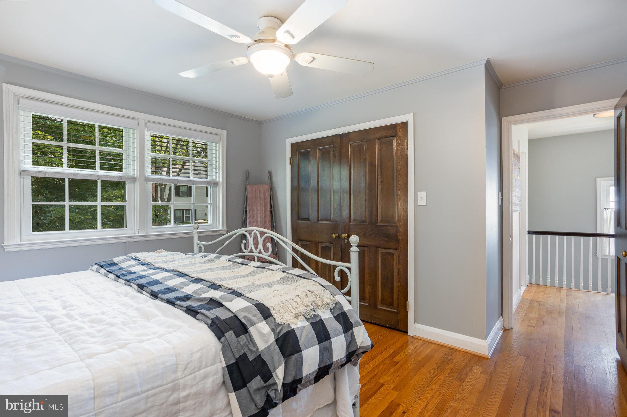 4407 Sedgwick Road Baltimore, MD 21210 - Photo 22 of 42 a bedroom with a large bed and a large window