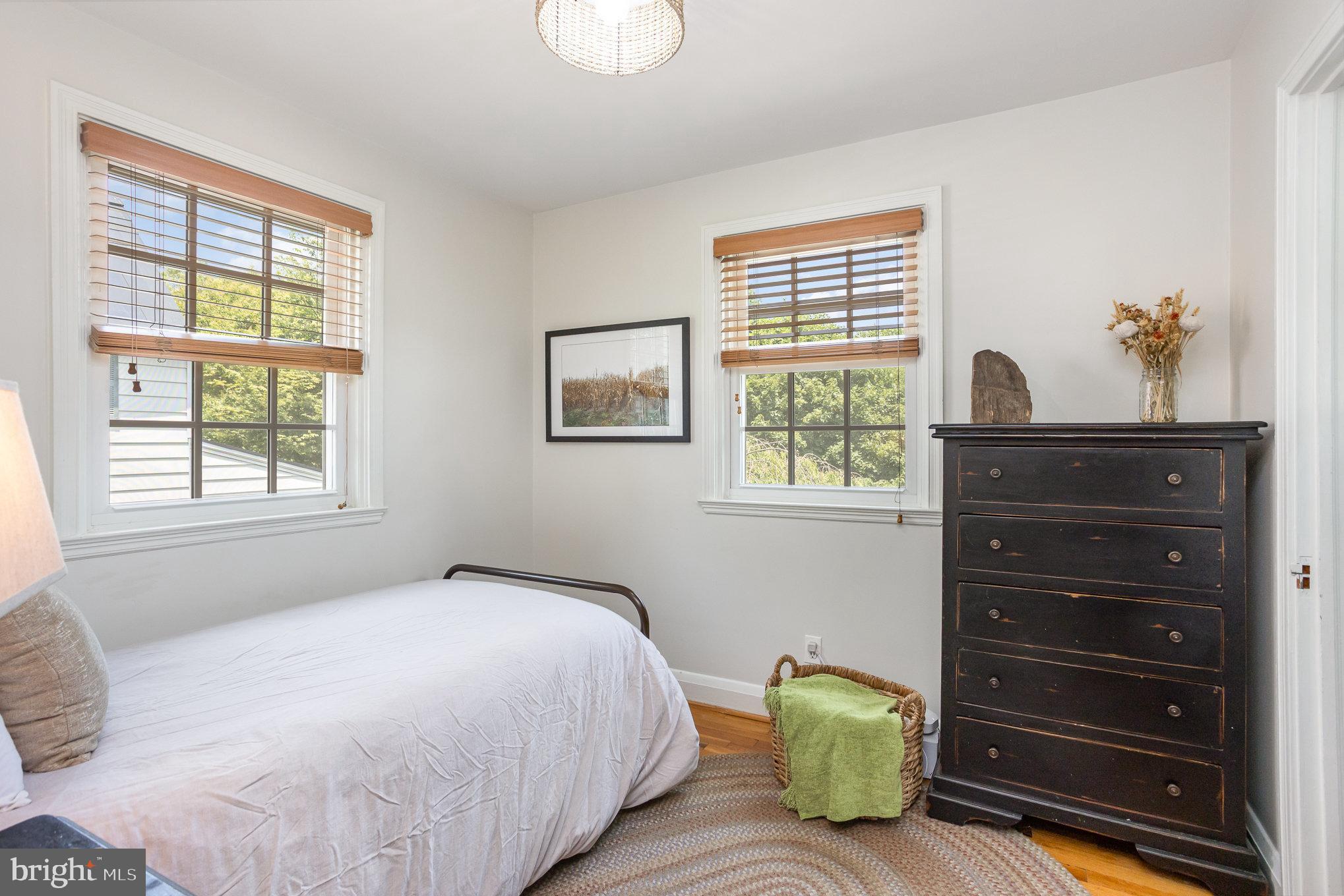 4407 Sedgwick Road Baltimore, MD 21210 - Photo 24 of 42 a bedroom with a bed and a dresser