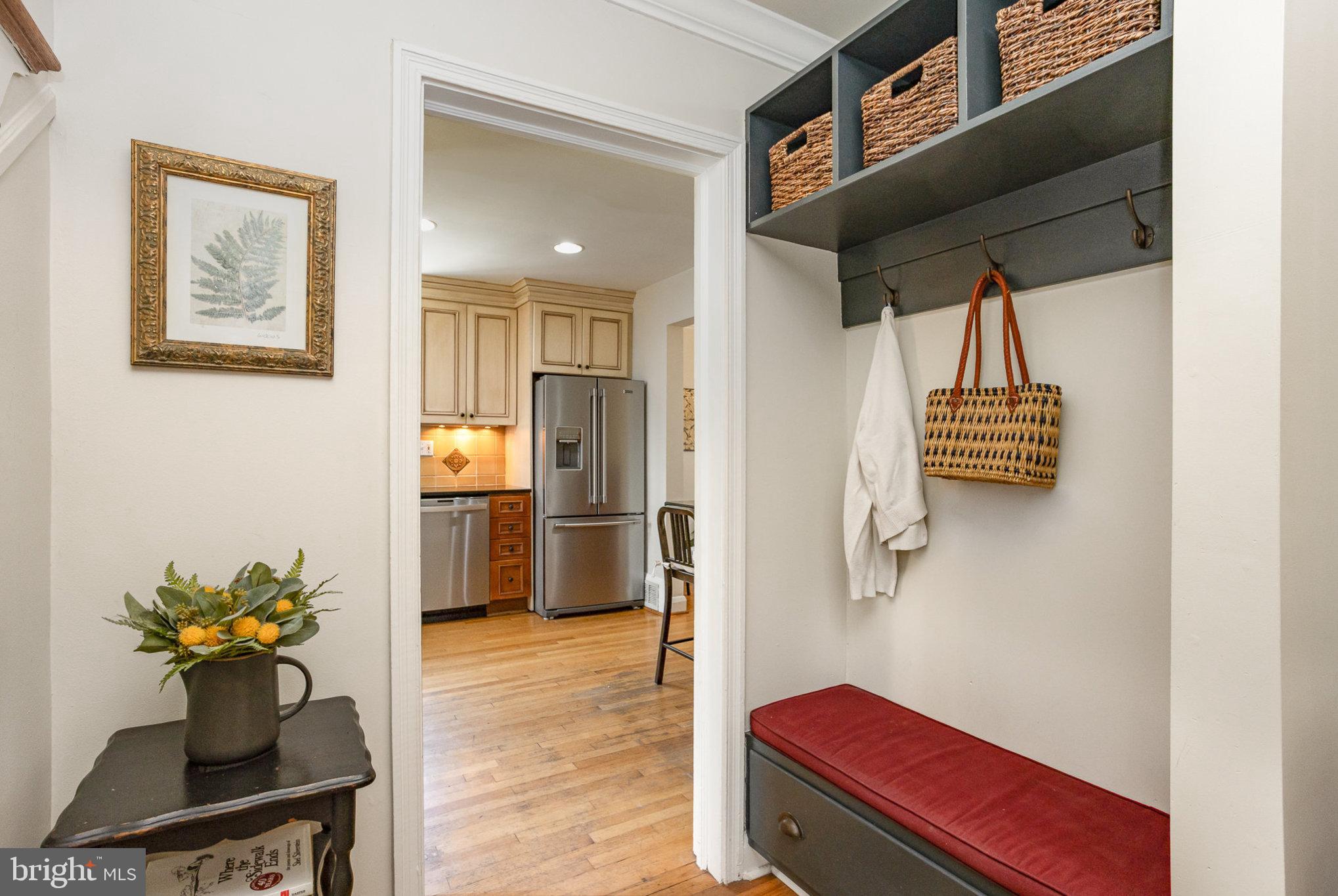 4407 Sedgwick Road Baltimore, MD 21210 - Photo 3 of 42 a view of hallway with furniture and wooden floor
