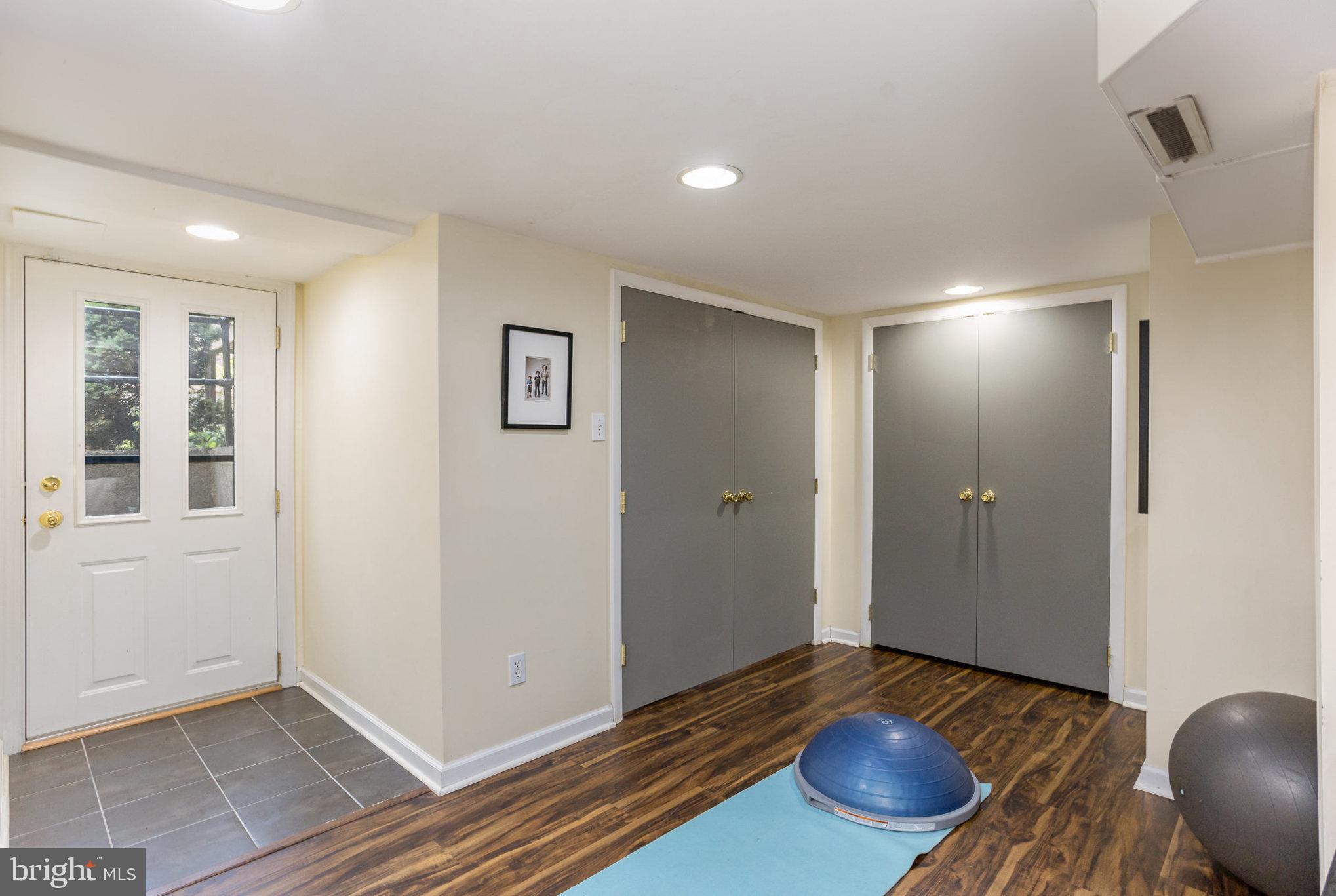 4407 Sedgwick Road Baltimore, MD 21210 - Photo 31 of 42 a room with furniture and wooden floor