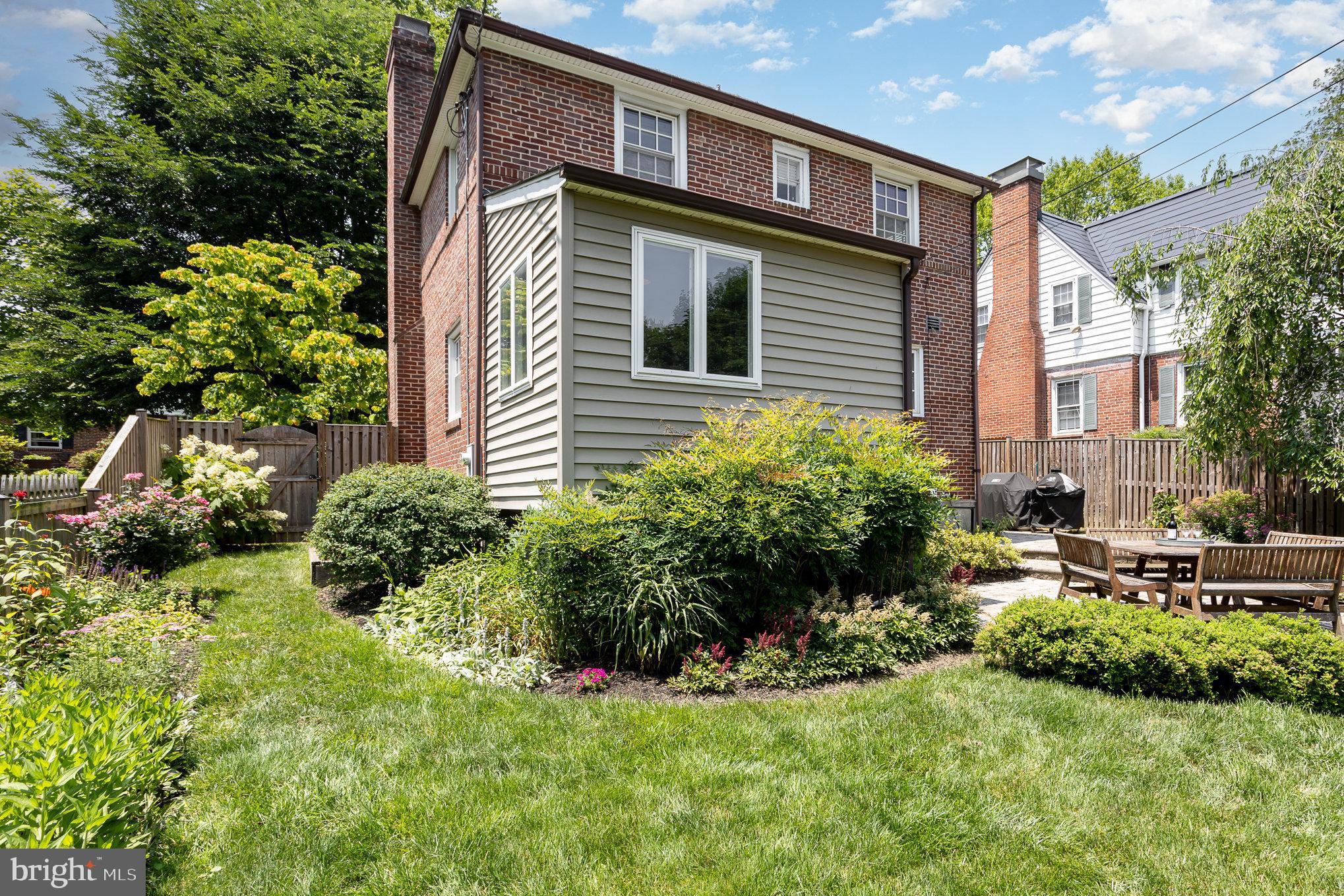 4407 Sedgwick Road Baltimore, MD 21210 - Photo 36 of 42 a front view of a house with a yard