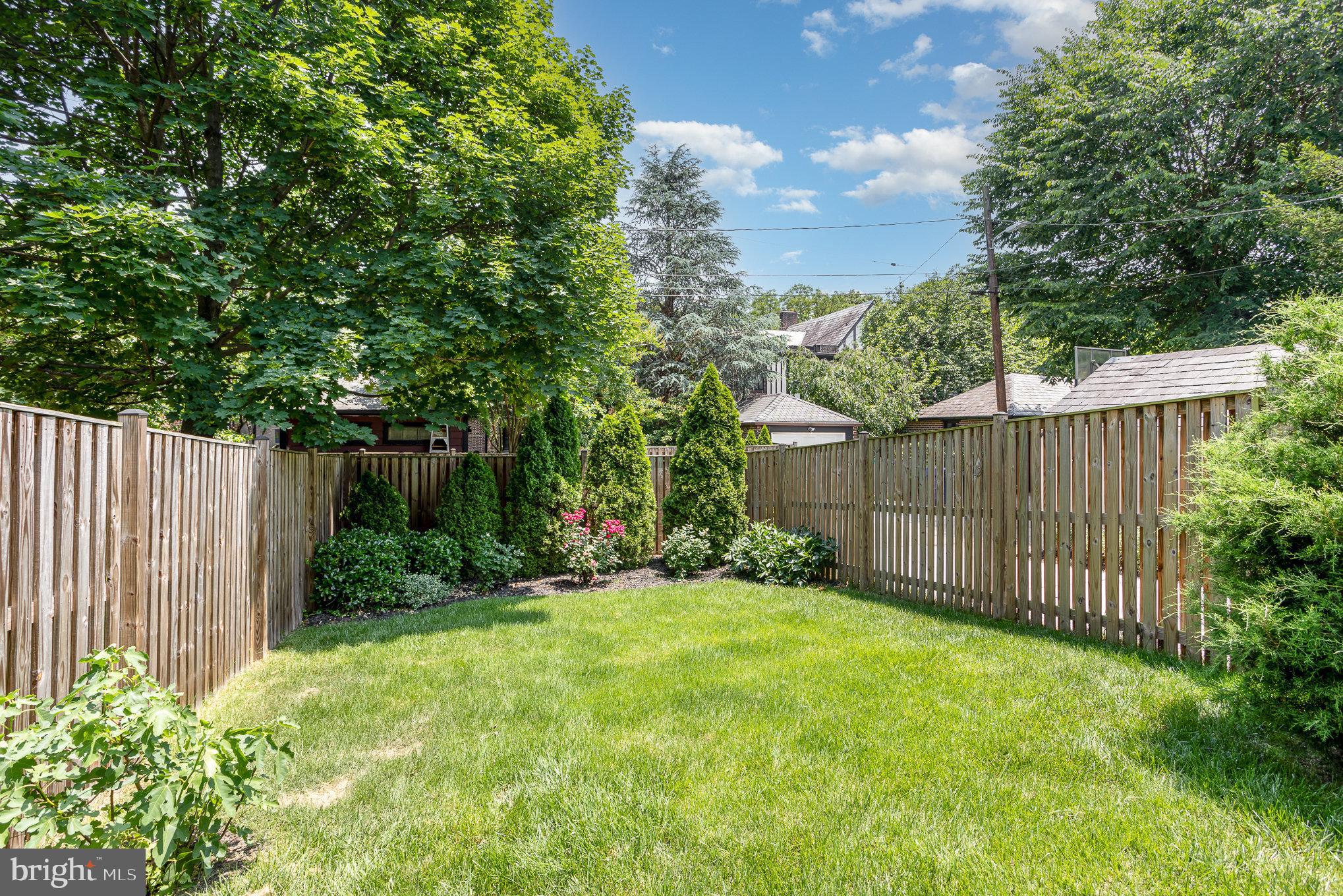 4407 Sedgwick Road Baltimore, MD 21210 - Photo 37 of 42 a view of a backyard with tree