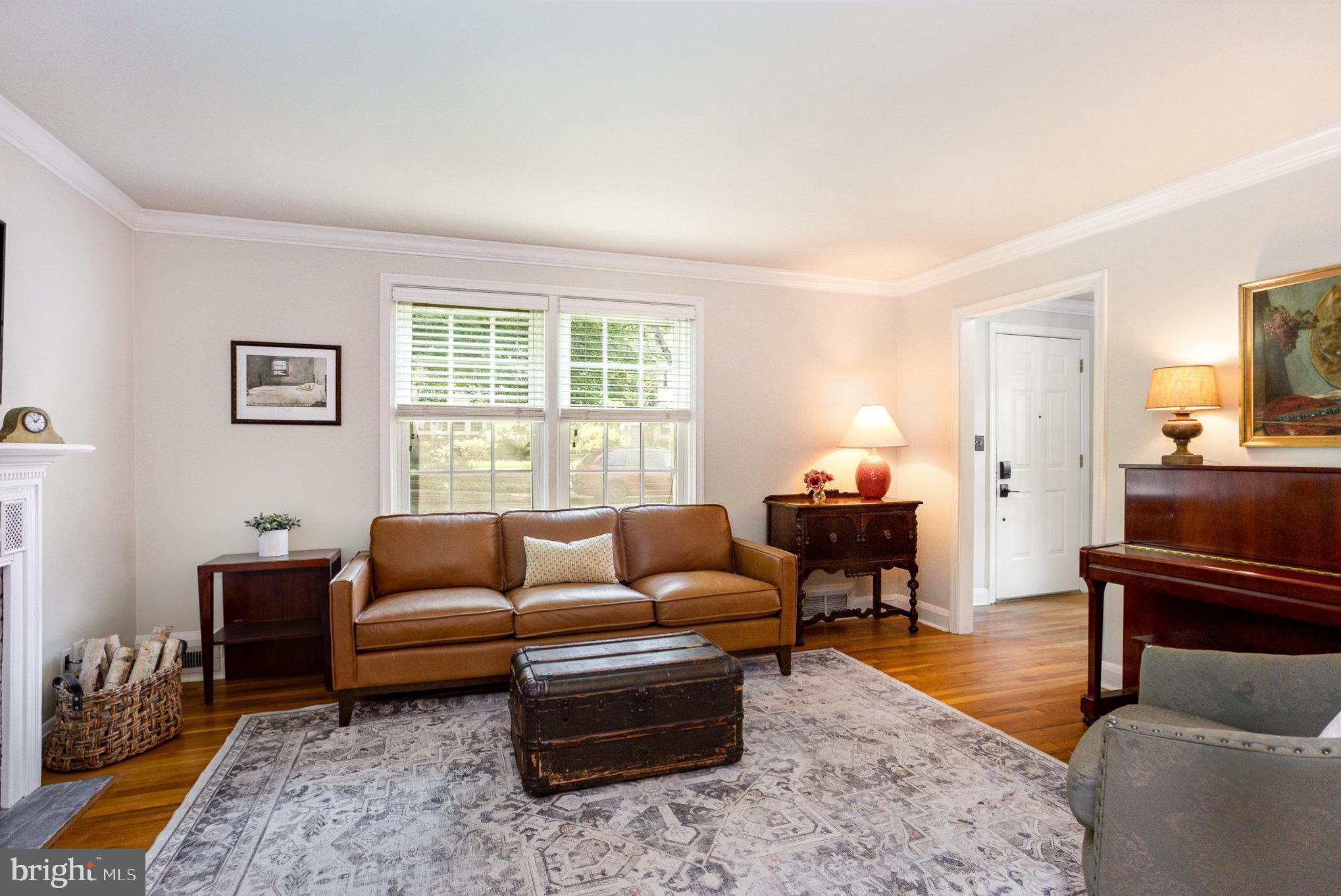 4407 Sedgwick Road Baltimore, MD 21210 - Photo 4 of 42 a living room with furniture a rug and a window