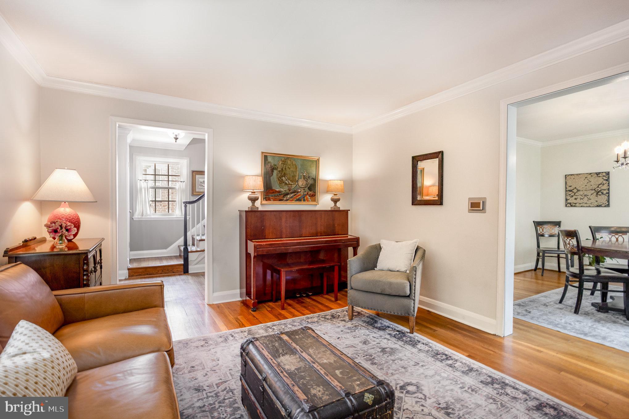 4407 Sedgwick Road Baltimore, MD 21210 - Photo 7 of 42 a living room with furniture and a wooden floor
