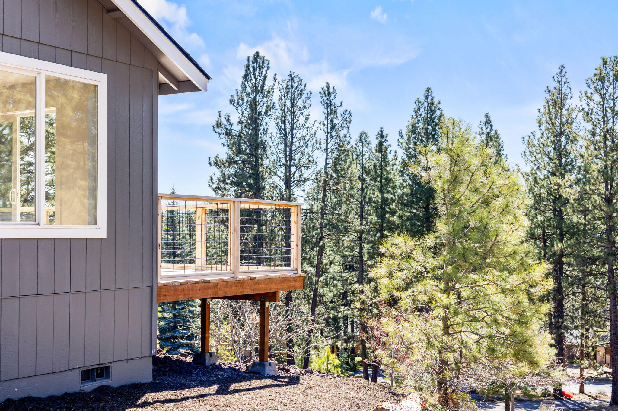 19126 Pumice Butte Road Bend, OR 97702 - Photo 29 of 40 a view of a chair and table in the balcony