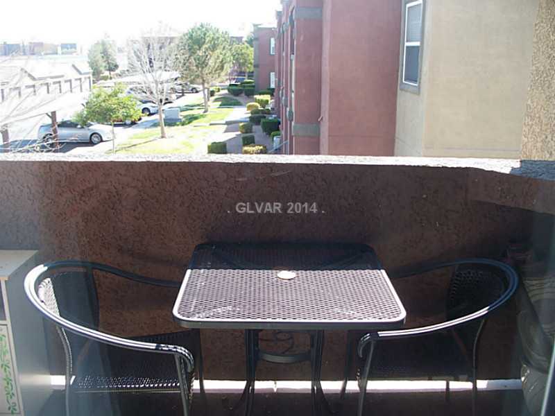 7255 West Sunset Road, Unit 2144 Las Vegas, NV 89113 - Photo 14 of 19 Patio/Deck. Dining Balcony, there is also a storage closet out here that holds the water heater