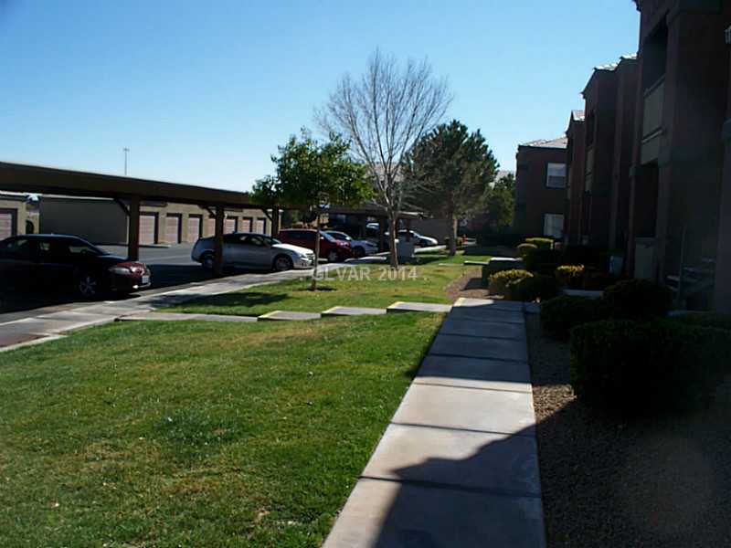 7255 West Sunset Road, Unit 2144 Las Vegas, NV 89113 - Photo 15 of 19 View. Downstairs green way view from the patio