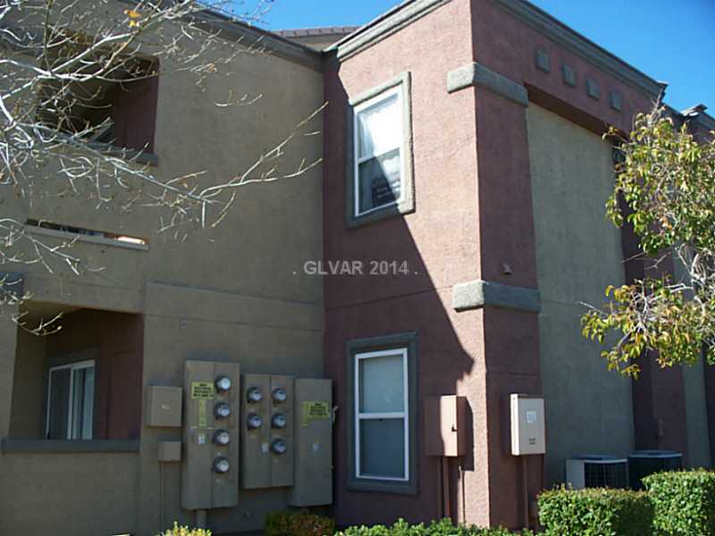 7255 West Sunset Road, Unit 2144 Las Vegas, NV 89113 - Photo 17 of 19 Exterior Back. upstairs corner unit