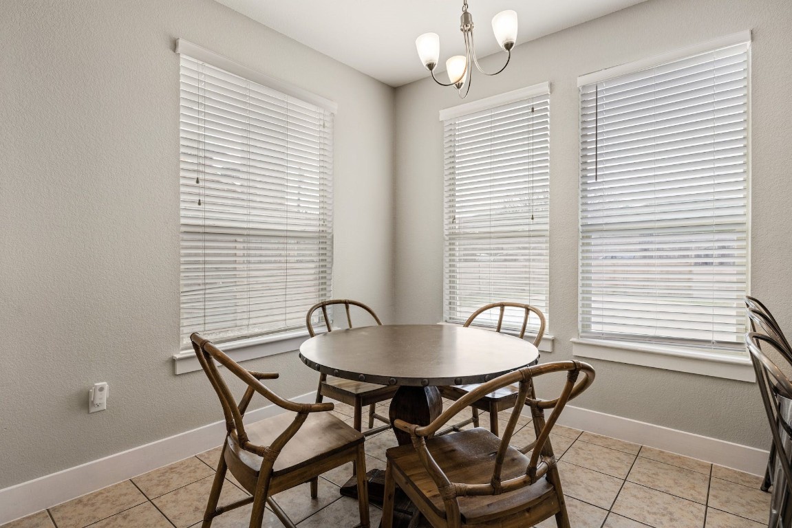 2215 Katy Lane, Unit C Georgetown, TX 78626 - Photo 11 of 26 a dining room with furniture and window