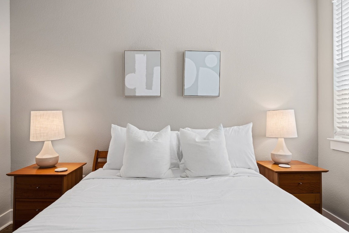 2215 Katy Lane, Unit C Georgetown, TX 78626 - Photo 19 of 26 a bedroom with a bed and window