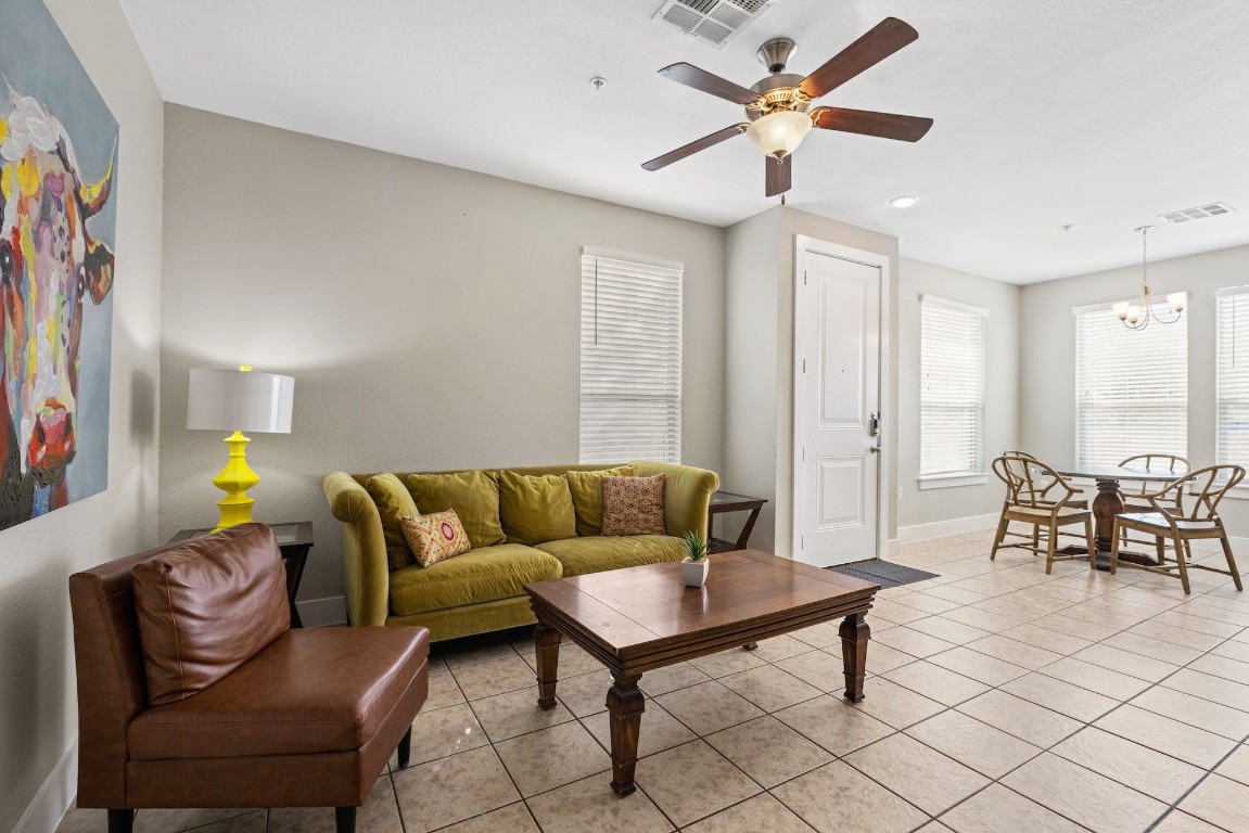2215 Katy Lane, Unit C Georgetown, TX 78626 - Photo 2 of 26 a living room with furniture and a table