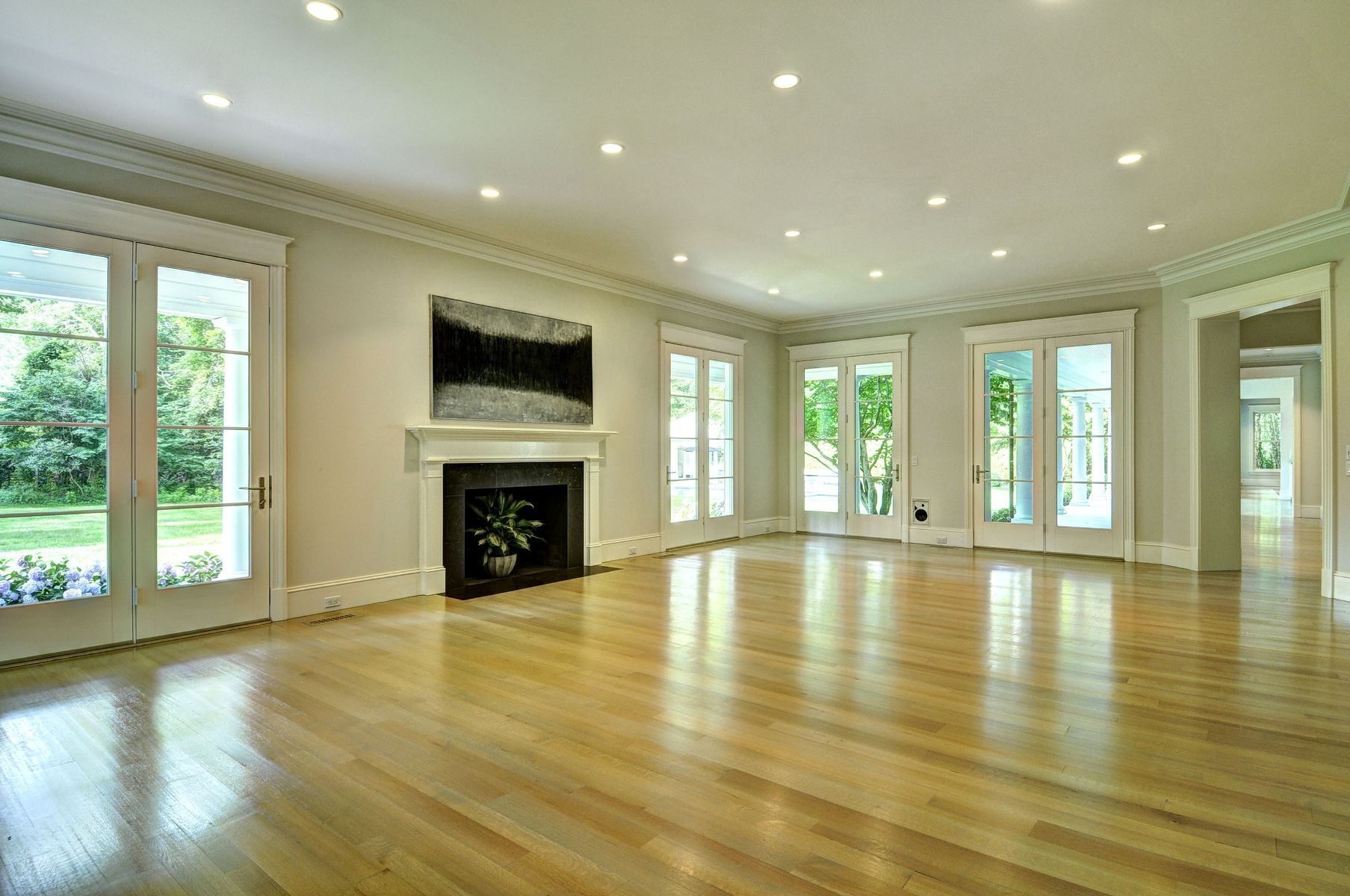 11 Jones Cove Road East Hampton, NY 11937 - Photo 13 of 25 a view of an empty room with a fireplace and a window