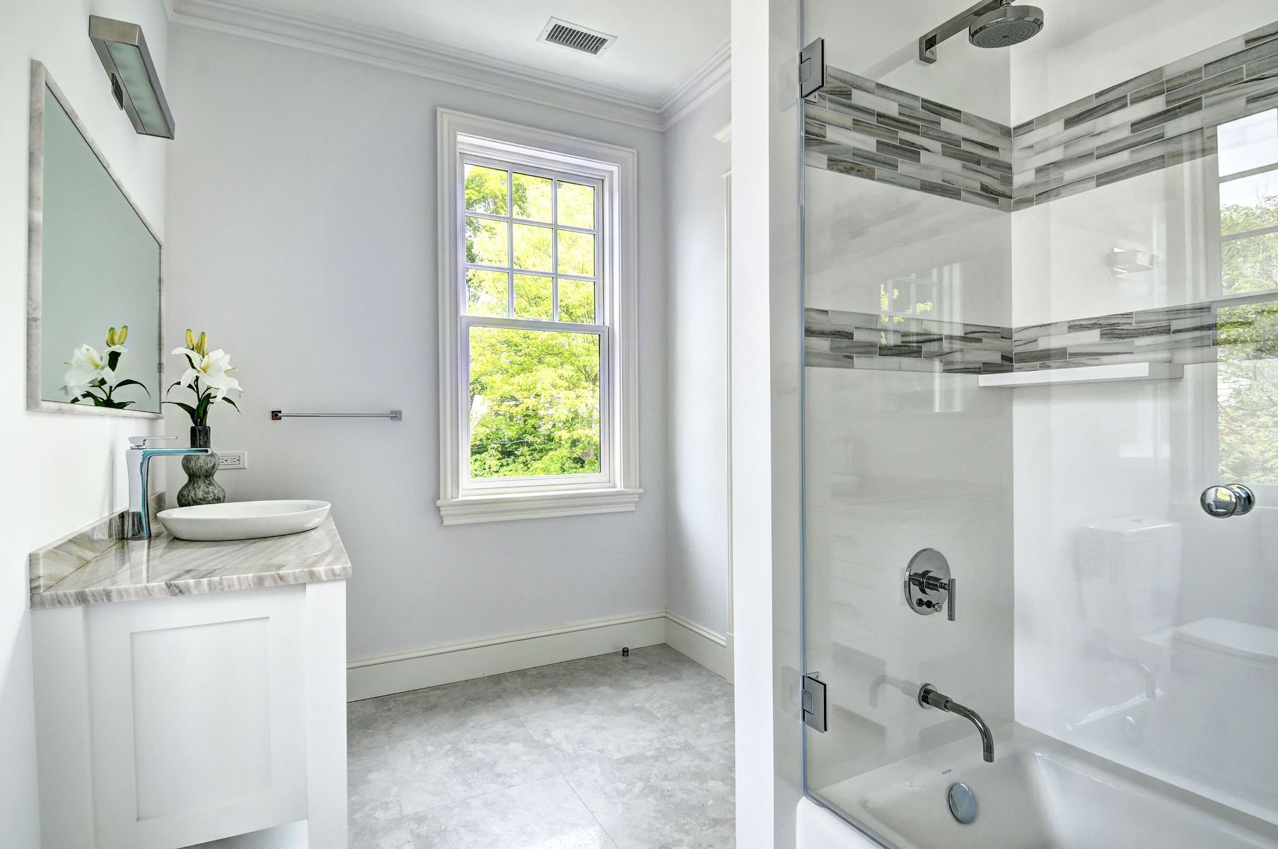 11 Jones Cove Road East Hampton, NY 11937 - Photo 16 of 25 a bathroom with a granite countertop sink a mirror and shower
