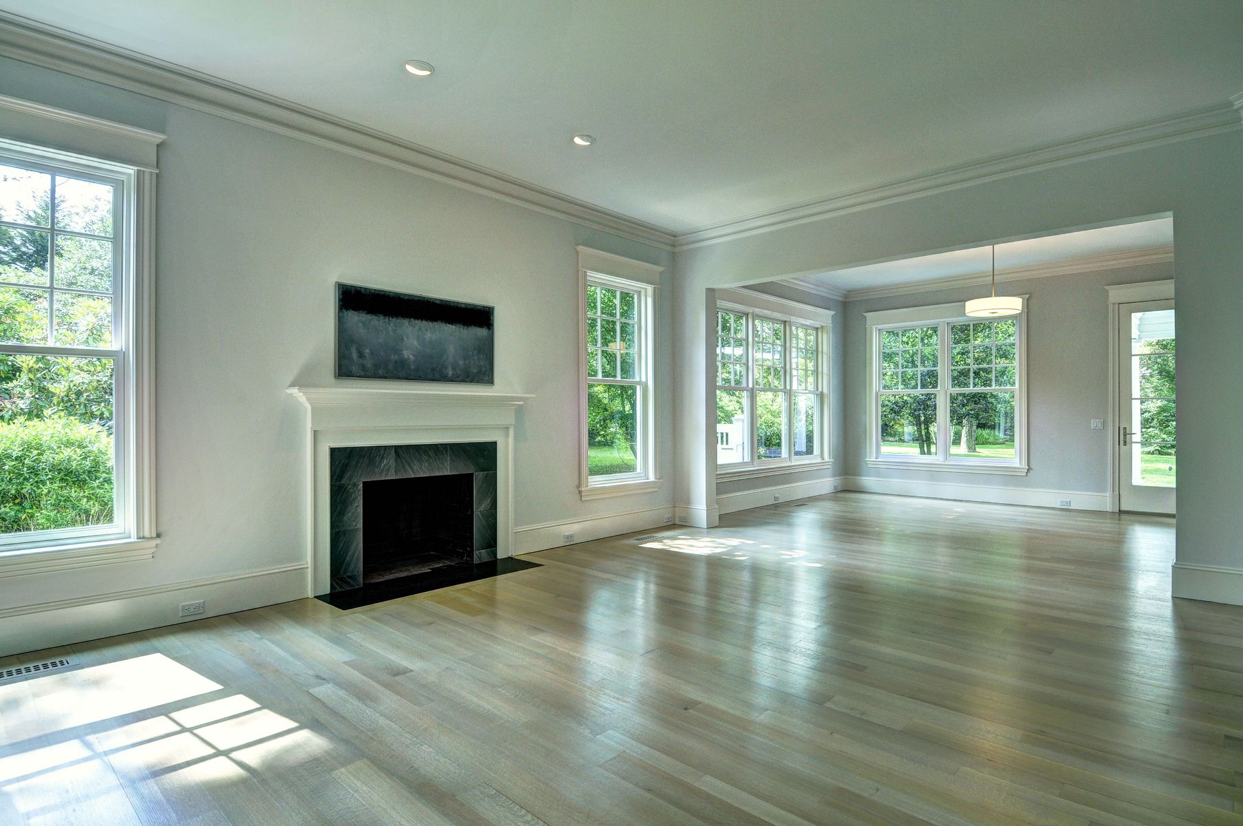 11 Jones Cove Road East Hampton, NY 11937 - Photo 19 of 25 a view of an empty room with wooden floor and a window